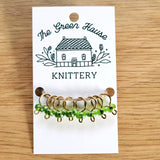 translucent bright green glass bead ring-style stitch markers in the new growth colour with gold wire